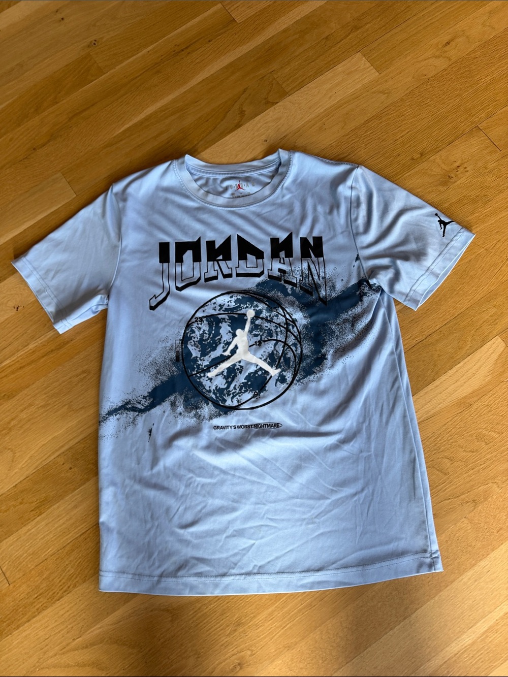 Jordan Light Blue Short Sleeve Graphic Tee with Navy and White Logo